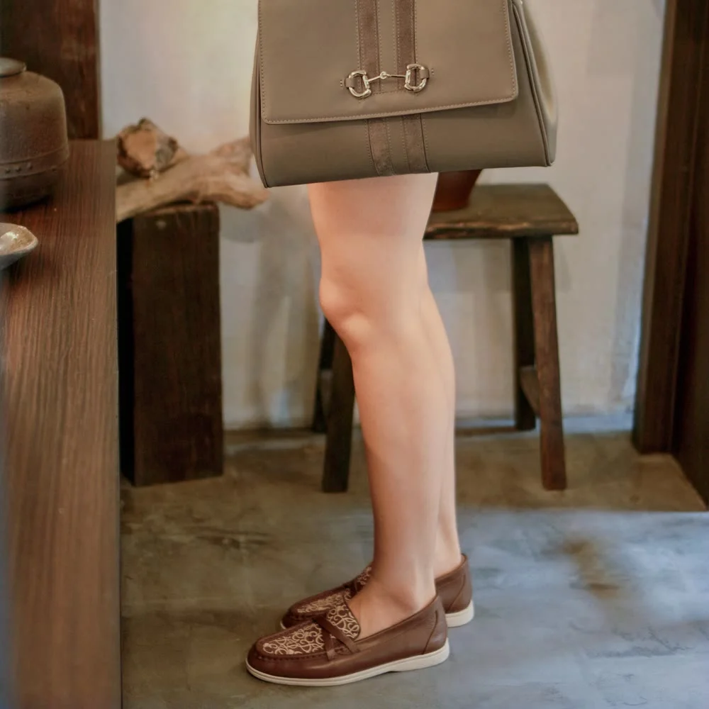 Leather loafers with the Maris bag